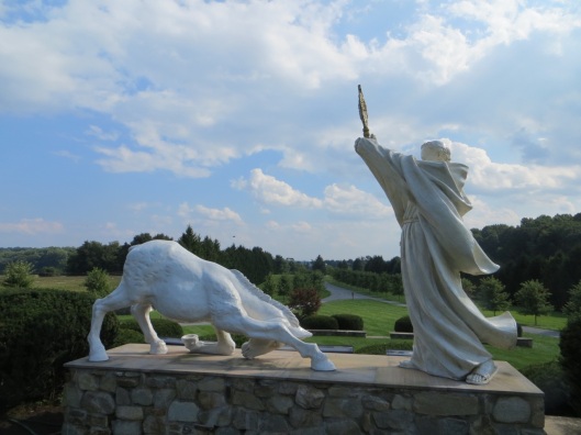 Miracle of the Mule, Shrine of Saint Anthony, Ellicott City, Maryland, USA.  This statue group is located on the grounds of the Shrine of Saint Anthony.  A mule or donkey kneels before the Eucharist, held aloft by Saint Anthony in a monstrance.