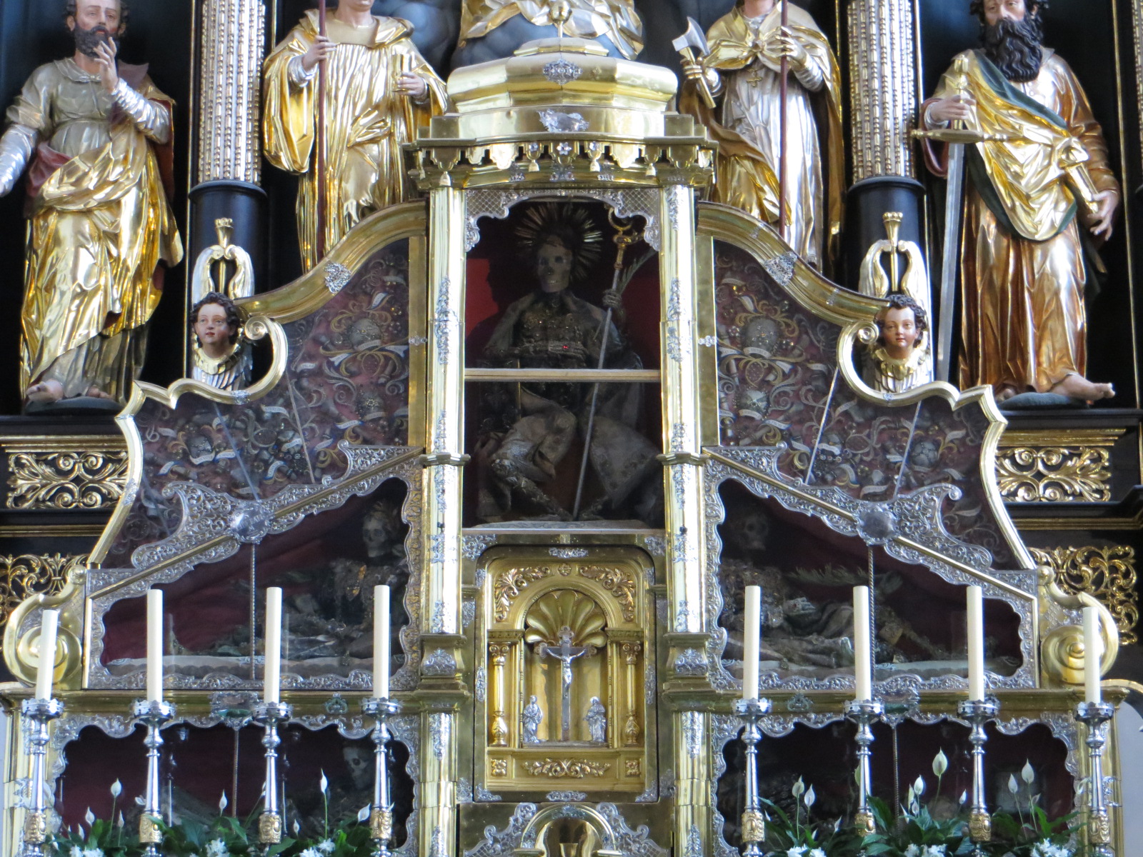 Skeleton of Abbot Konrad II (center) with the Bodies of Four Catacomb Saints, Collegiate Church of Saint Michael, Mondsee, Austria